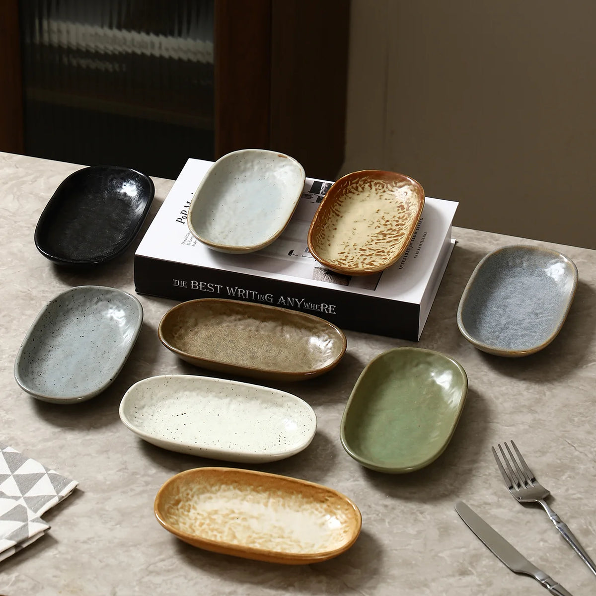 Fleck spotted oval ceramic plate